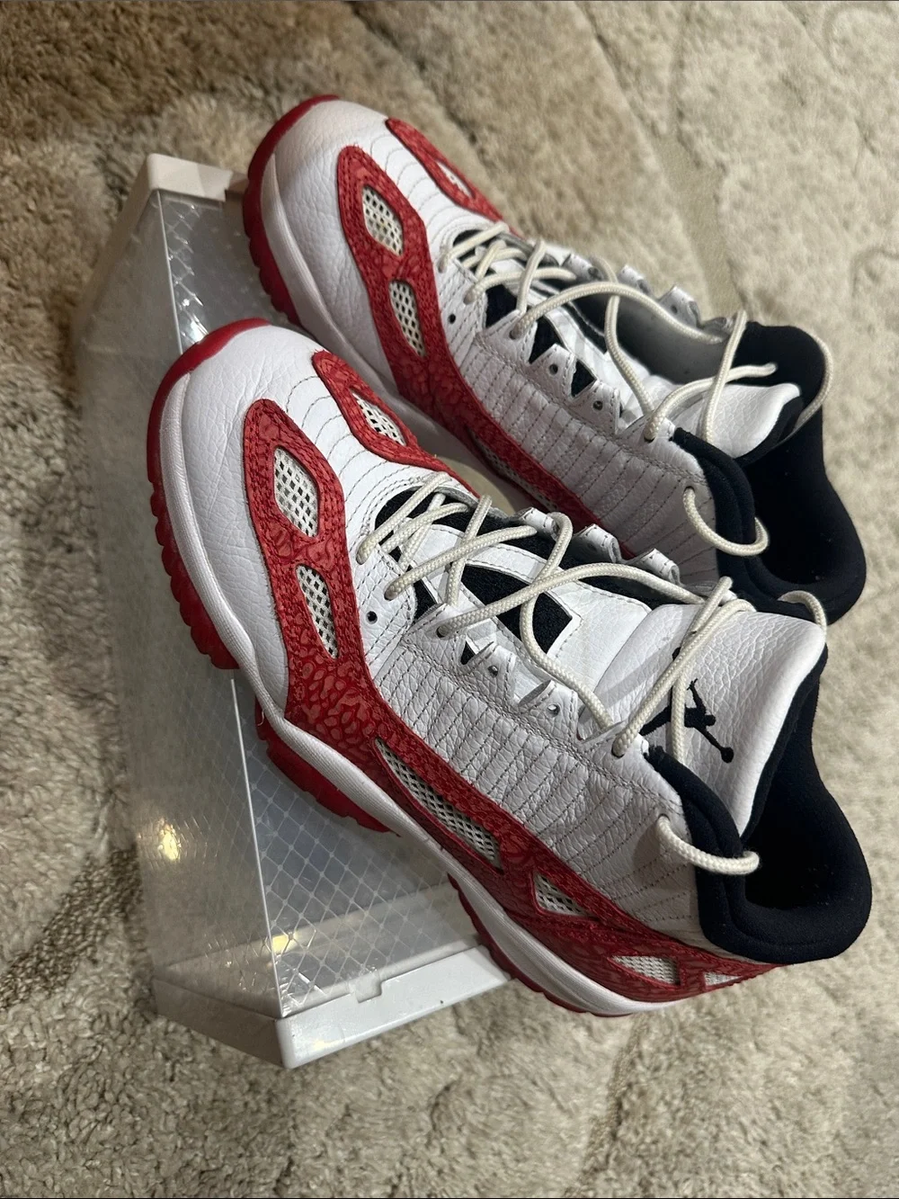 Jordan Retro 11 Low-Top Sneakers in White, Red and Black